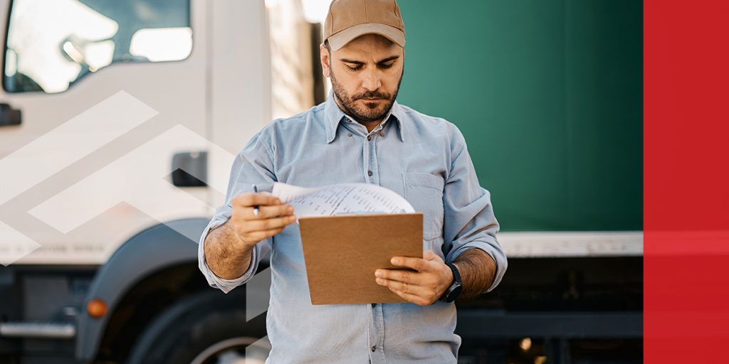 A man filing an IFTA quarterly report.